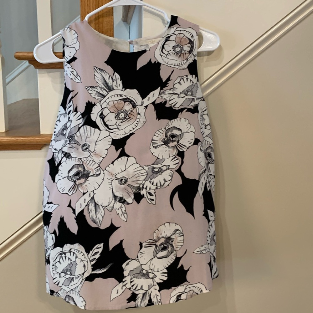 Pretty sleeveless blouse pink and black print in good condition